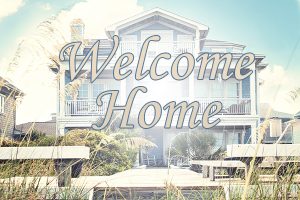 Home Builder Ocean County, Beach home with blue exterior with text "Welcome Home" superimposed
